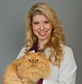 Dr. Kelley Dees-Atkinson employee portrait with cat
